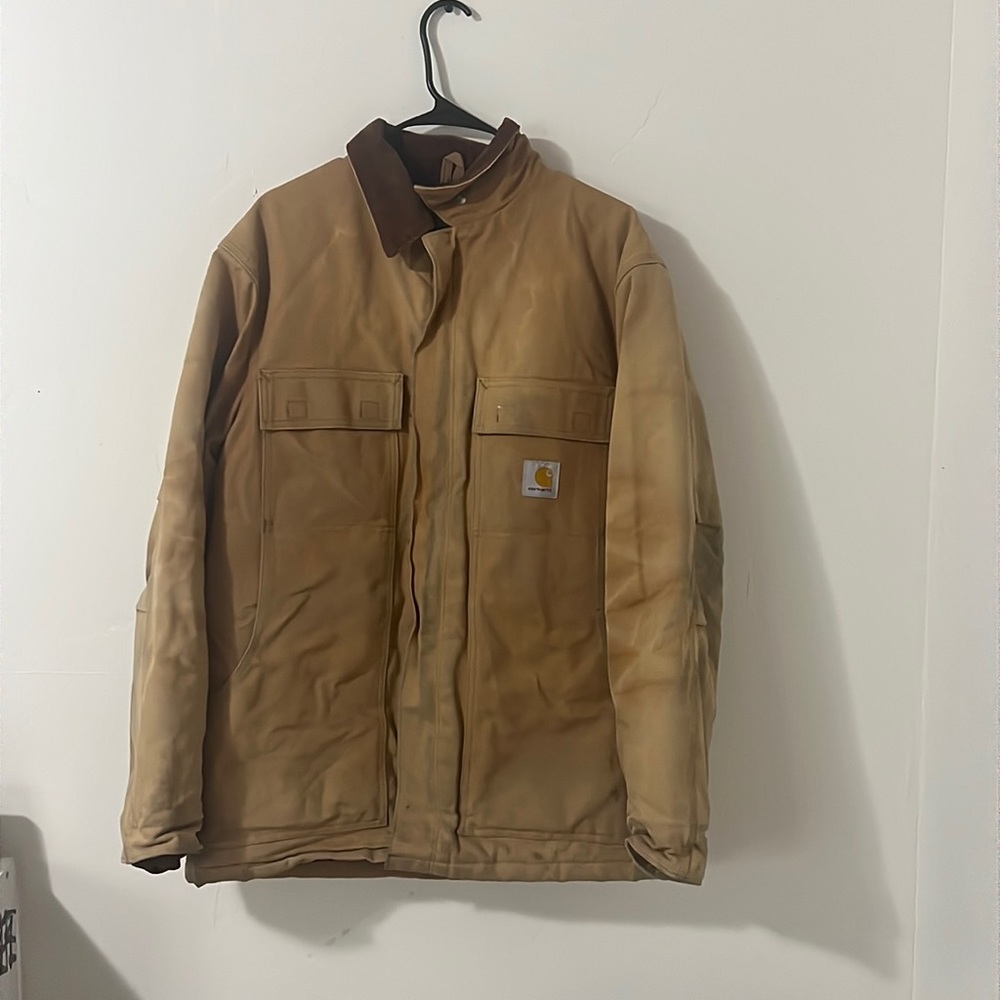 Size medium carhartt jacket. Distressed